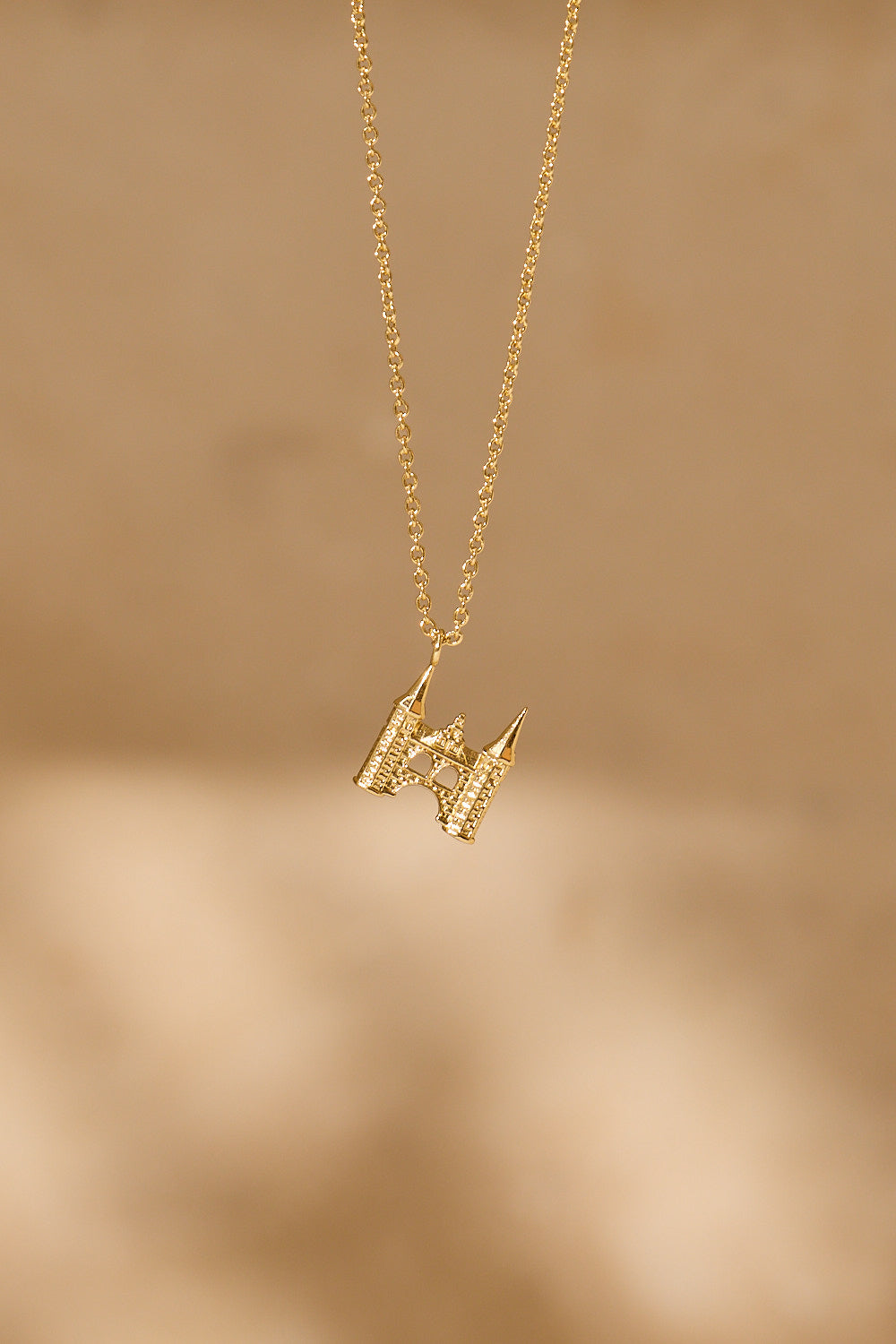 Sneek-waterpoort-ketting-verguld